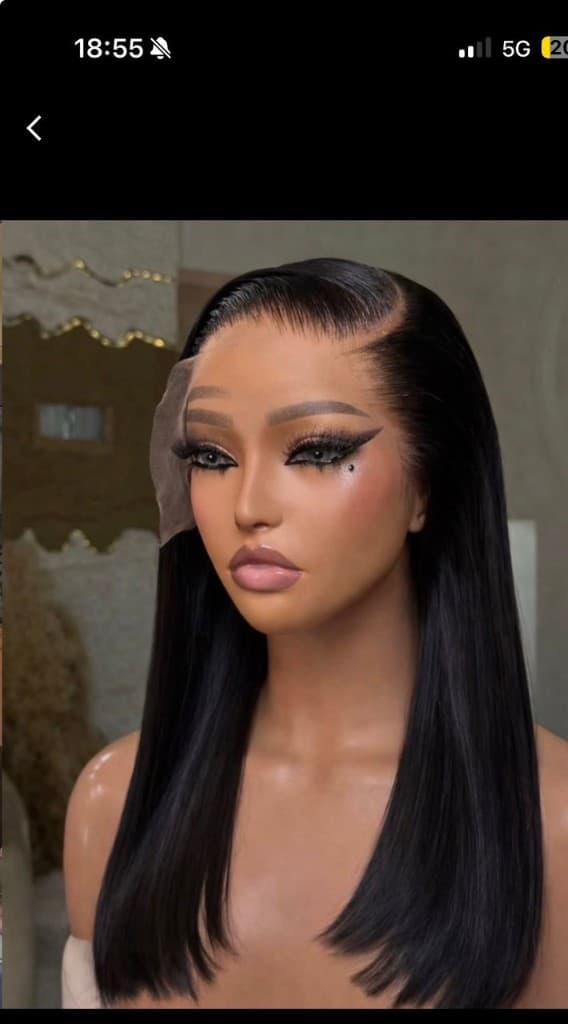 Model wearing a premium body wave lace front wig with natural styling